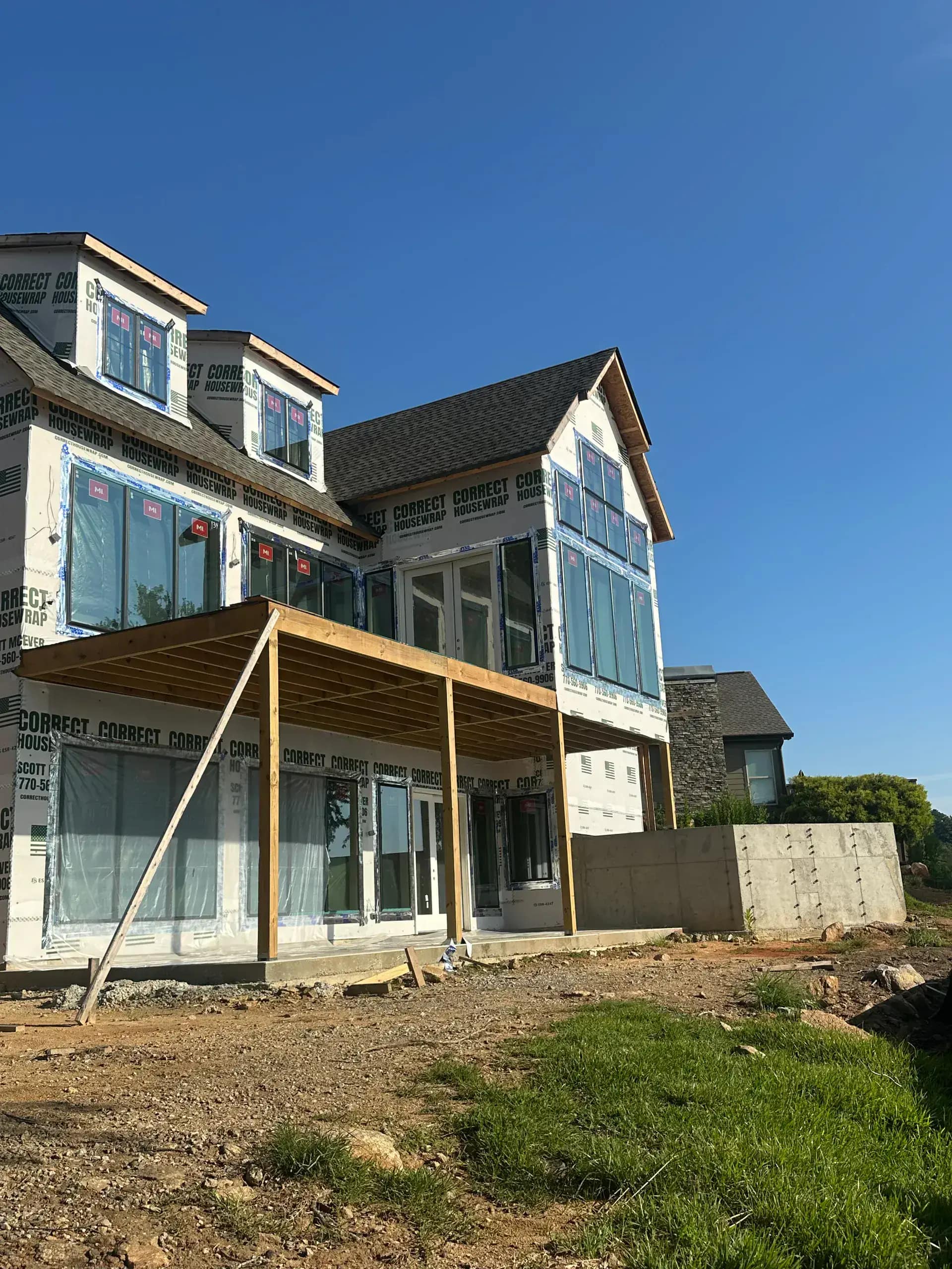 Closed-cell spray foam applied to exterior wall framing during new construction in Dearborn Heights MI