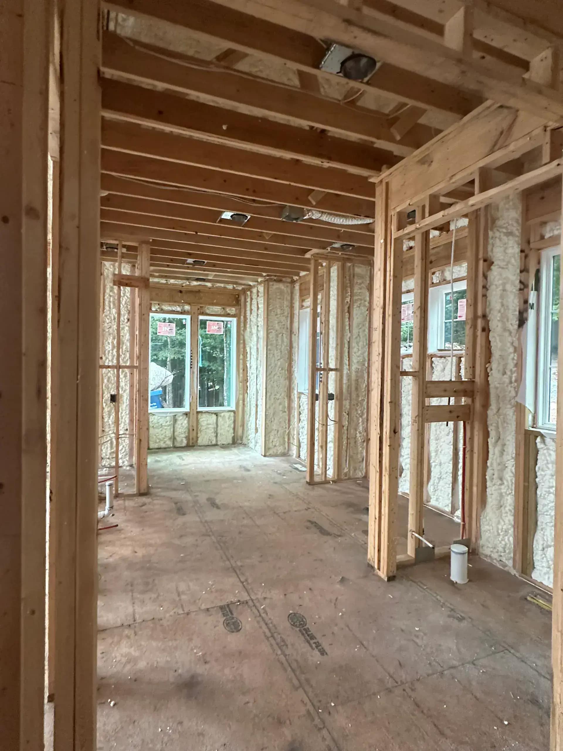 Before photo of deteriorated attic insulation needing replacement in a Metro Detroit home