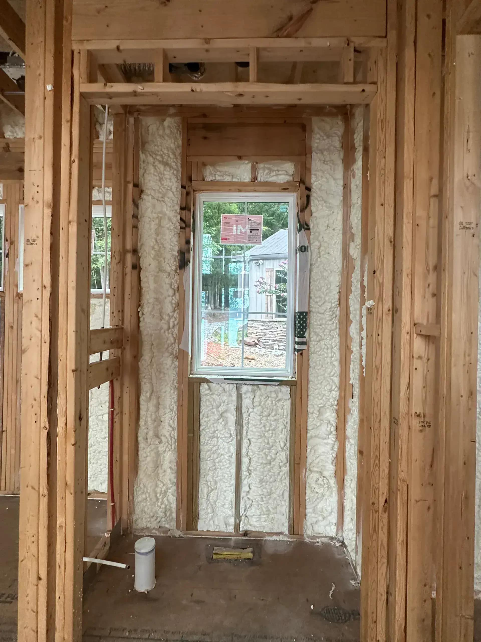 Full crawl space encapsulation with vapor barrier and closed-cell rim joist foam