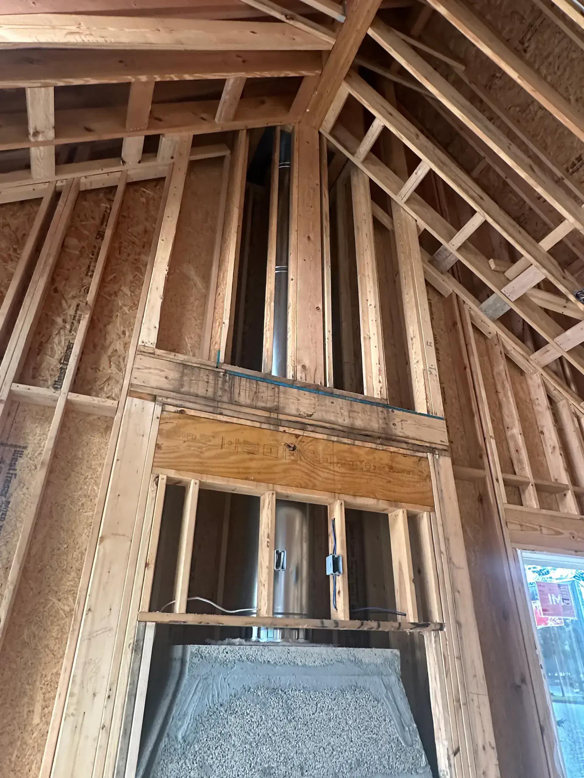 Rim joist and sill plate sealed with closed-cell spray foam in a historic Dearborn home