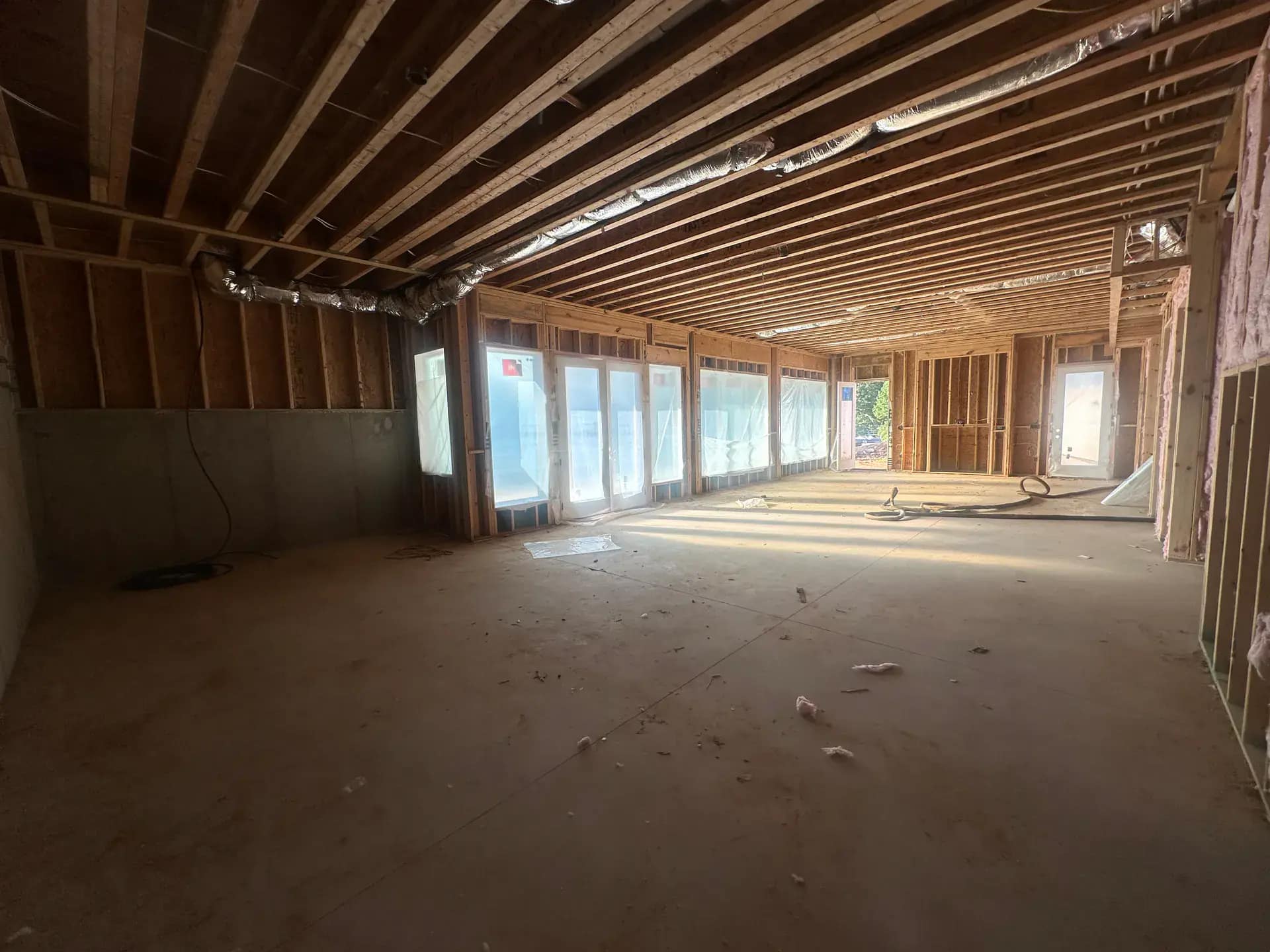 Completed spray foam insulation in a tight crawl space under a Ferndale bungalow