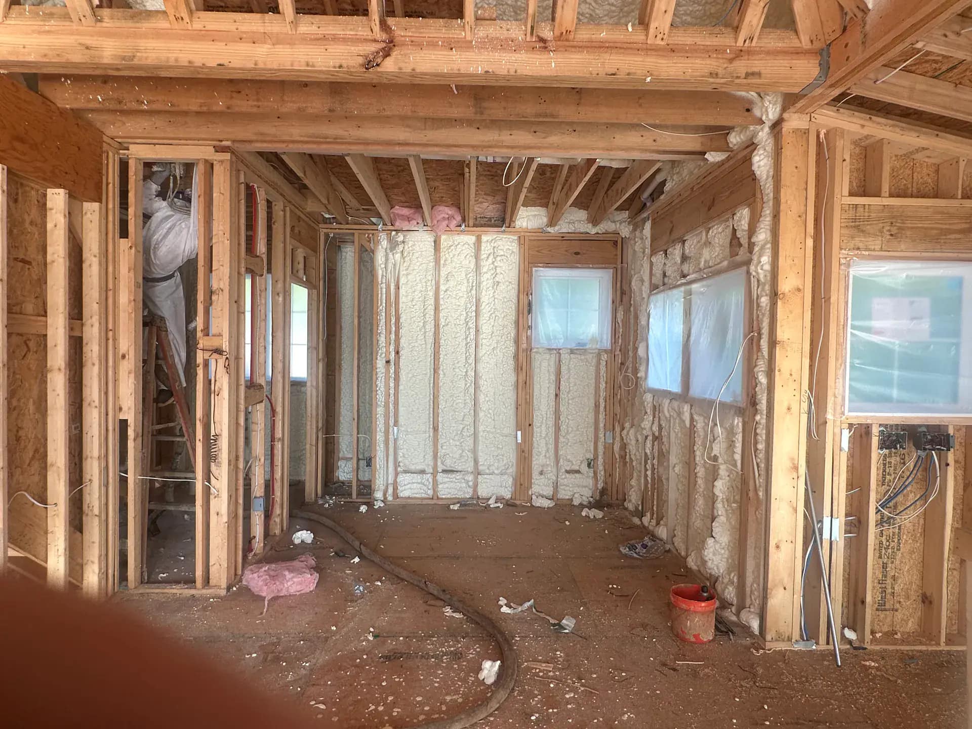 New construction spray foam installation coordinated with custom builder in Rochester Hills