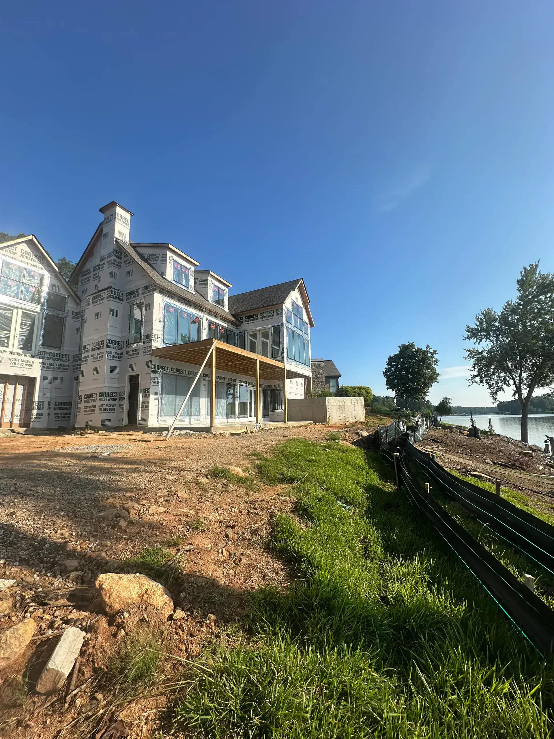 Full-home spray foam project exterior view showing a luxury Metro Detroit residence